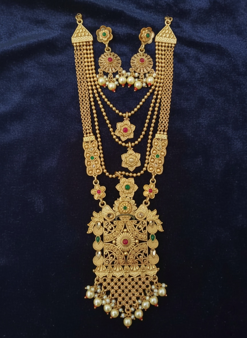Product Details Product Title: Grand Antique Gold-Plated Layered Rani Haar with Kundan & Pearl Detailing - Jewellery by Luxe Aura